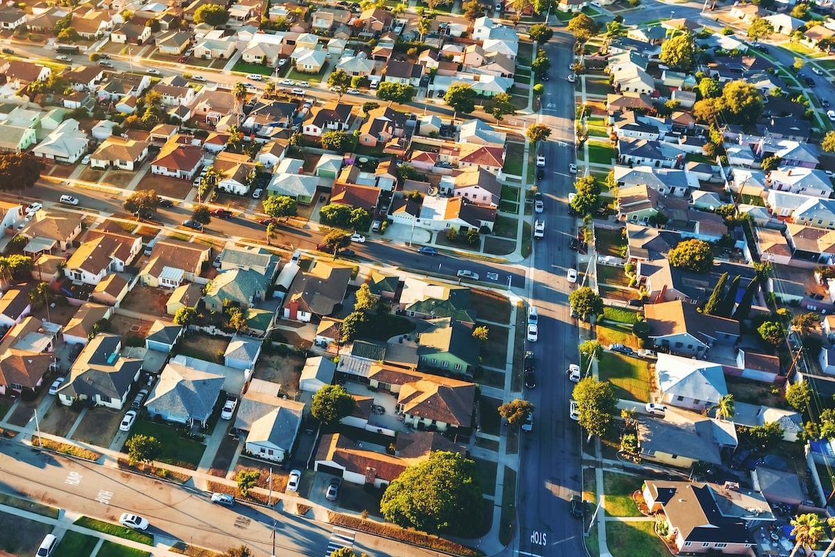 Aerial view of neighborhood of single-family homes, which are becoming increasingly difficult to afford
