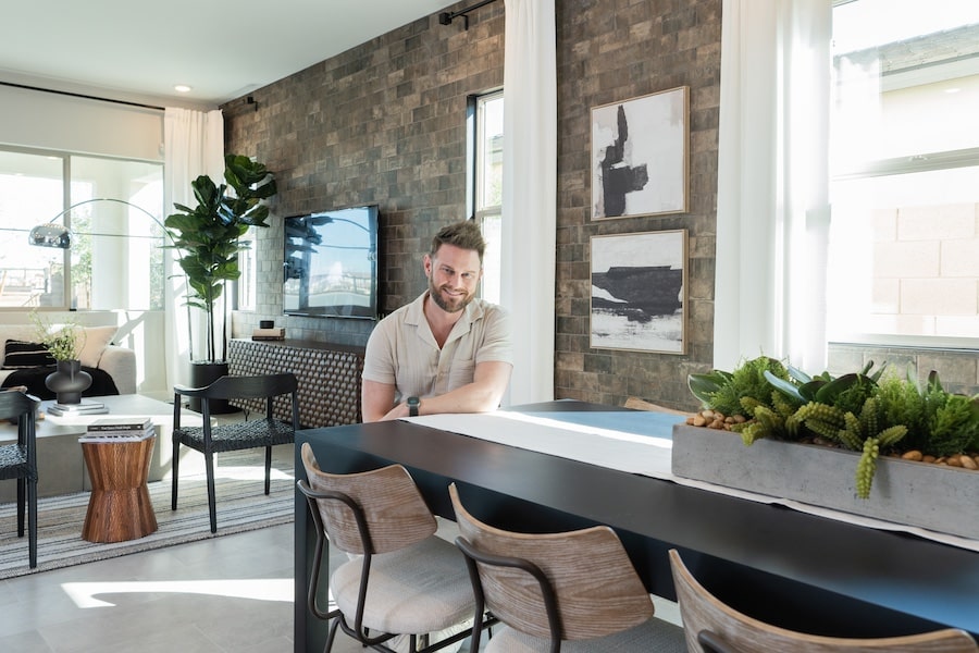 Interior designer Bobby Berk in a Tri Point Homes model home