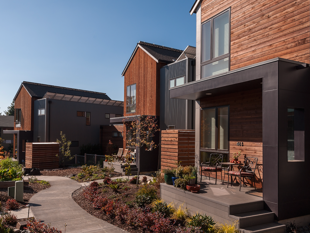 The homes at Grow have a modern architectural style, with forms reminiscent of farm buildings