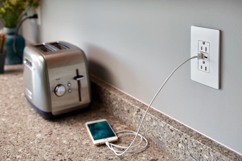 Legrand Ultra Fast USB Outlet toaster phone plugged in