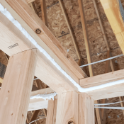 New-home framing with air-sealing product applied