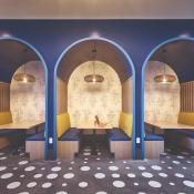 Modern booths with bold blue and yellow colors