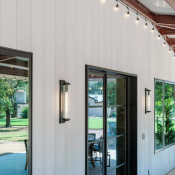 Austin barn house vertical siding with Acre sheets