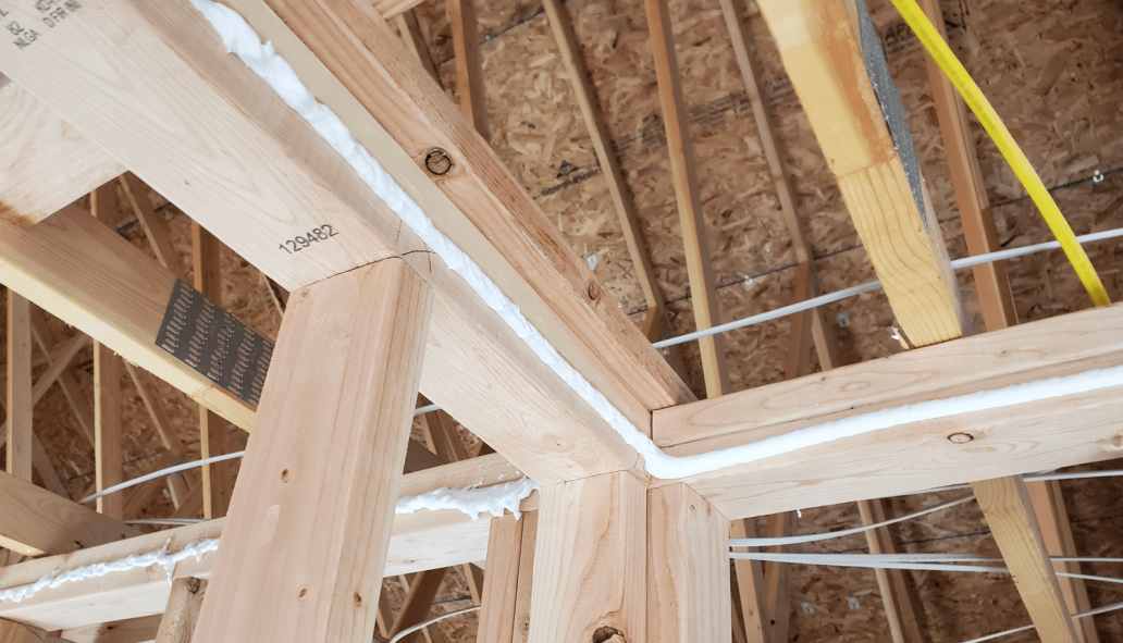 New-home framing with air-sealing product applied
