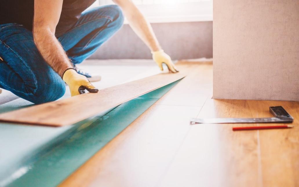 Homeowner lays new flooring