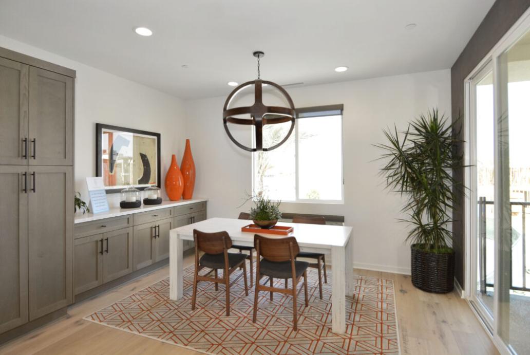 Buyers at Lighthouse by Taylor Morrison in Costa Mesa, Calif., can work in the informal dining room, which offers plentiful storage to keep work materials organized and within reach