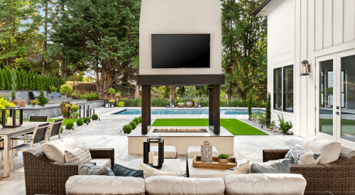 Outdoor living features that are on-trend for homebuyers include outdoor TVs like this one