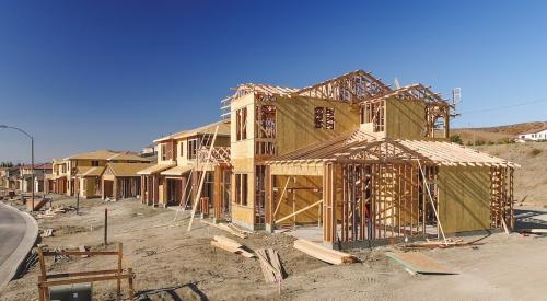 Single-family homes at the framing stage of construction