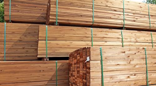 Stacks of wooden boards in a lumber yard