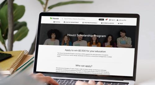 A student looks at the Houzz scholarship landing page on a laptop