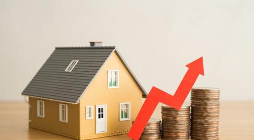 A home stands next to stacks of coins. A red arrow sits on top of the coin stacks, showing they are increasing in value from left to right.