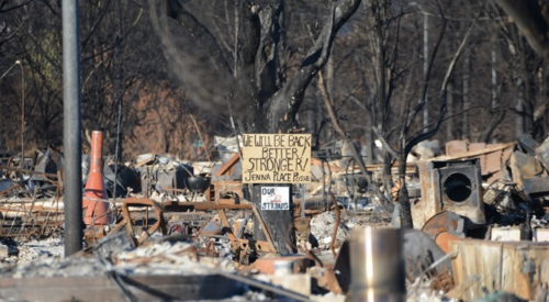 Debris and the rebuilding effort after wildfire in Coffey Park, California