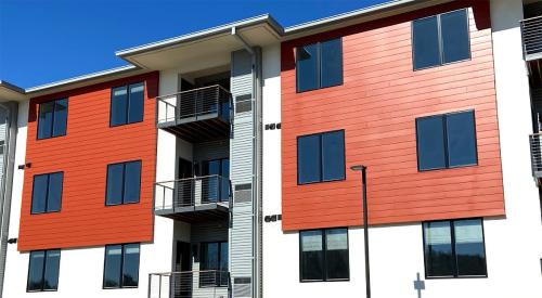 TruExterior Channel siding in a warm orange hue helps set this multifamily project apart