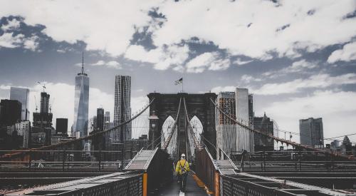 Man walking on bridge in New York