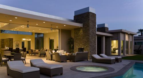 Backyard of a luxury home with pool and jacuzzi