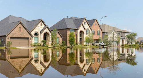 Suburban homes with extreme street flooding