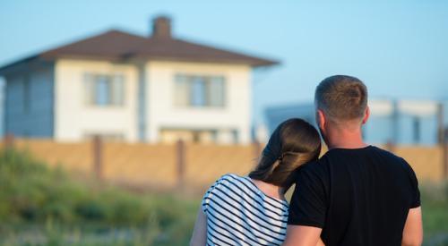 Couple looking at house