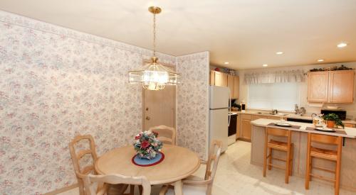 Outdated kitchen dining room in pastel colors