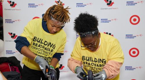 Two high school students at an 'I Built This' event 