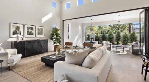 Dahlin Group's Miraval II interior living space looking out to outdoor living area in pocket neighborhood