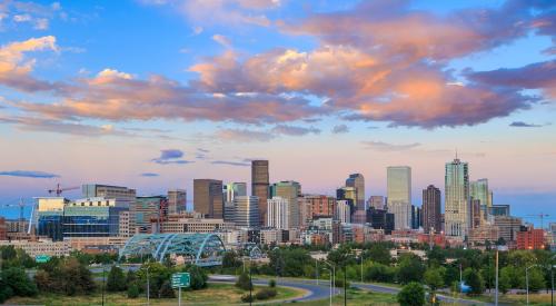 View of skyline in Denver, where active listings of homes for sale are down