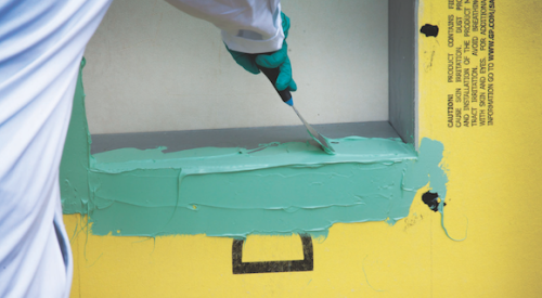 Dow Corning 778 Silicone Liquid Flashing being applied to a window opening.