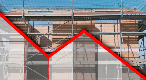 New-home construction with red downward chart line superimposed