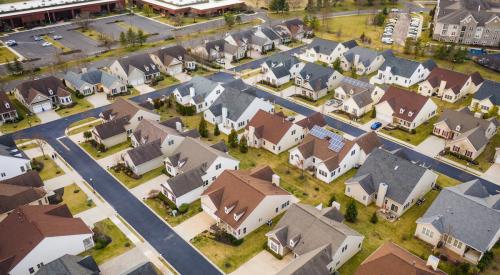 Aerial view of rows of homes in a new housing development
