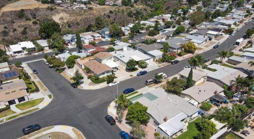 Aerial view of small houses in suburban San Diego neighborhood