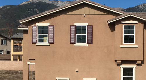 Home exterior with one-coat stucco cladding