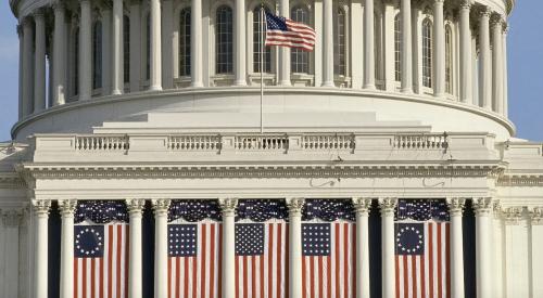 U.S Capitol draped with American flags