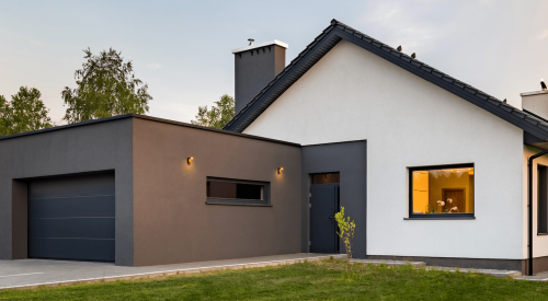 Value-engineered home exterior with minimalist styling on the facade