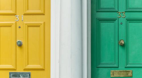 Two front doors of different colors