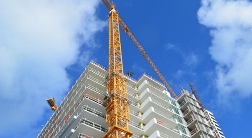 Construction crane on a high-rise building