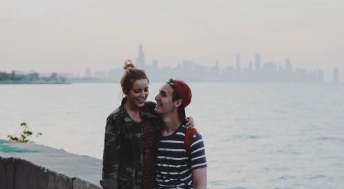 Couple laughing by the water