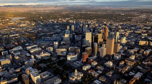 Downtown Denver and surrounding suburbs at dusk