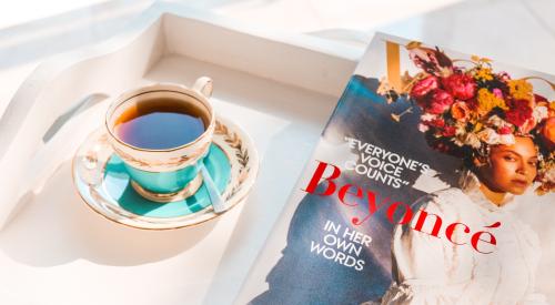Breakfast tray with tea and Beyoncé cover of Vogue magazine September 2018 issue