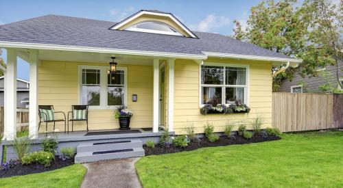 Small yellow entry level house