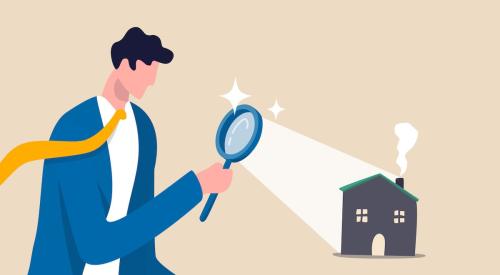 Person looking at home with magnifying glass 