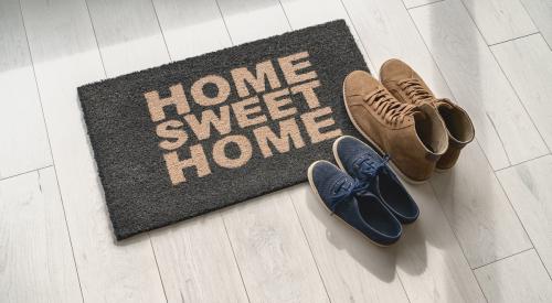 Welcome mat that says "home sweet home"