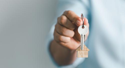 Homebuyer holding house keys
