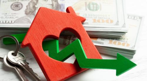 Stack of cash with small red home and flattening arrow