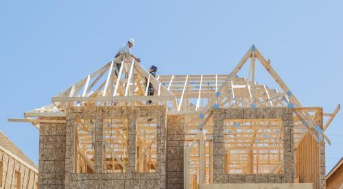Builders on wood-framed new house