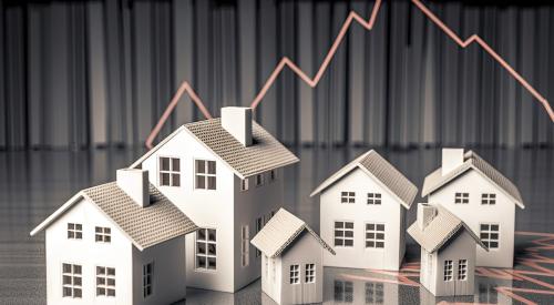 Line graph rising and falling behind cluster of white houses to indicate housing market fluctuations