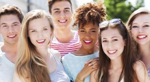 A group of Millennials smiling