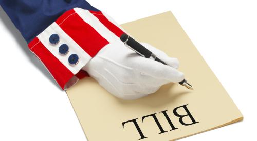 Uncle Sam sleeve with pen writing a bill