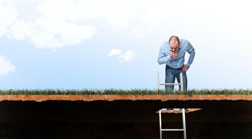 mortgage demand and man looking down a hole