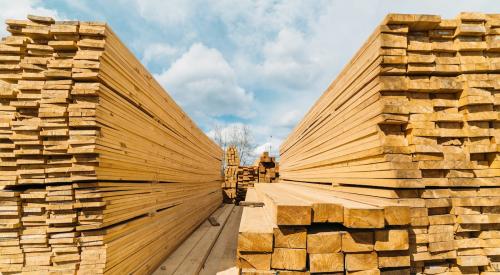 Lumber stacked in lumber yard