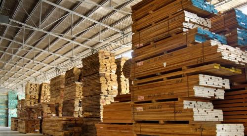 Stacks of lumber inside warehouse