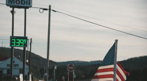 American flag against rural backdrop